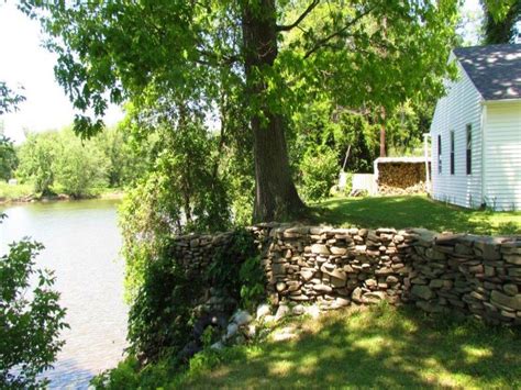 a <b>cottage</b>, boat docks, additional outbuildings, barns & various buildings related to the orchard & vineyards. . Susquehanna river cottage for sale